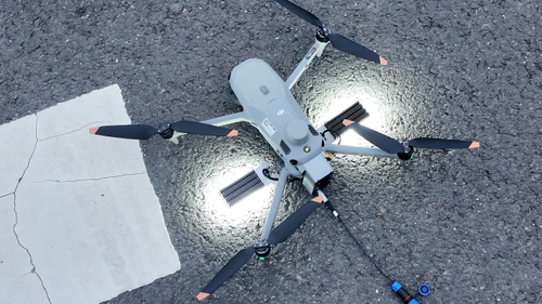 последние новости компании о Arrive Light, Illuminate Instantly | Field Application of the DJI M4 Tethered Lighting System